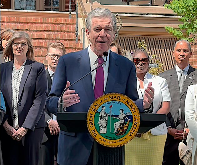 Gov. Roy Cooper presents a new statewide plan called “All Ages, All Stages NC,” during a May 2, 2023, event at the Governor’s Mansion